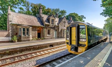 The Old Ticket Office with train going by